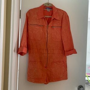 One piece romper with front zip closure